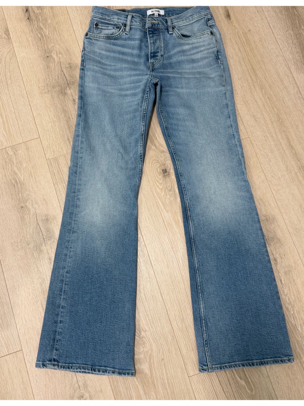 Re/Done Women's Flared Jeans in Light Blue Washed Denim